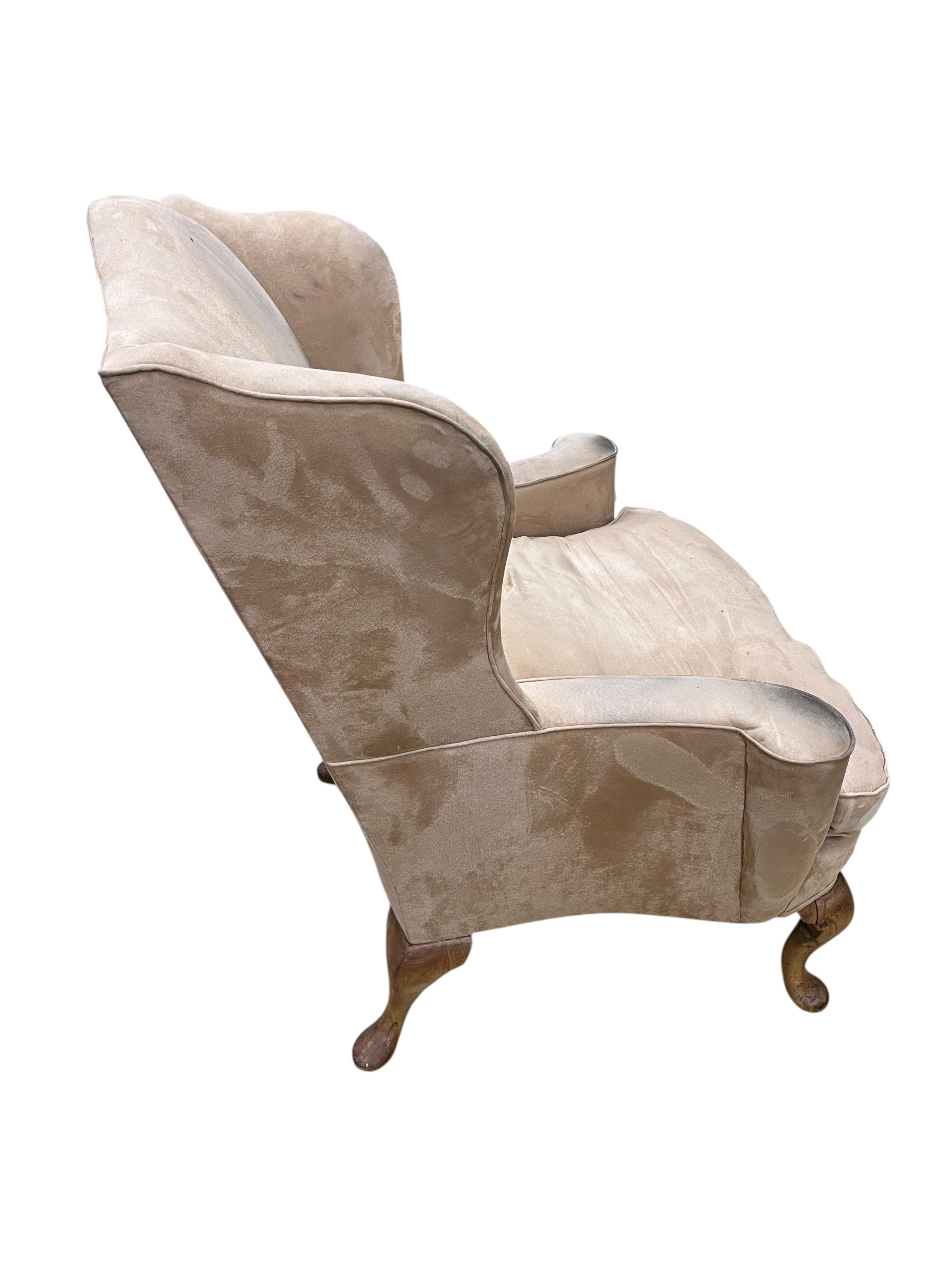A pair of George III upholstered armchairs, width 85cm, depth 65cm, height 106cm